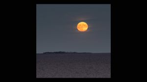 Big Moon Rising Over Atlantic Island